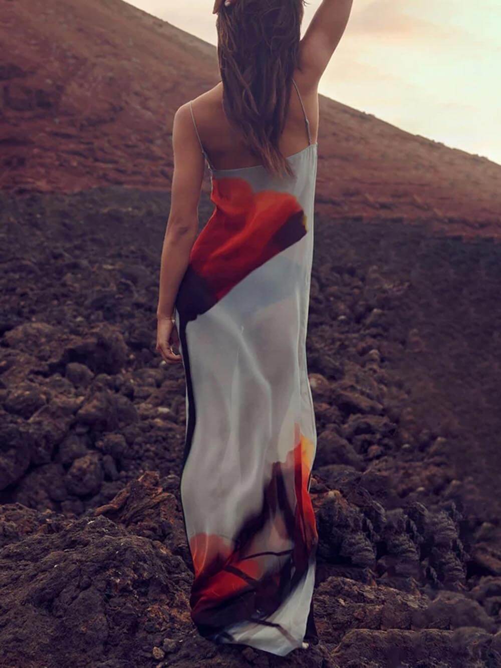 Women's beautiful blue abstract print flowy maxi sundress, an elegant and comfortable summer vacation dress.