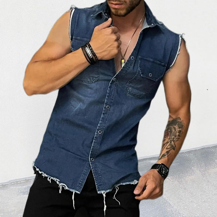 Front view of men's sleeveless vest with vintage finish, button front & utility pockets. Rugged summer streetwear.