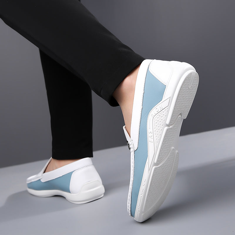 Dapper men's two-tone slip-on loafers, ideal for sophisticated everyday fashion.