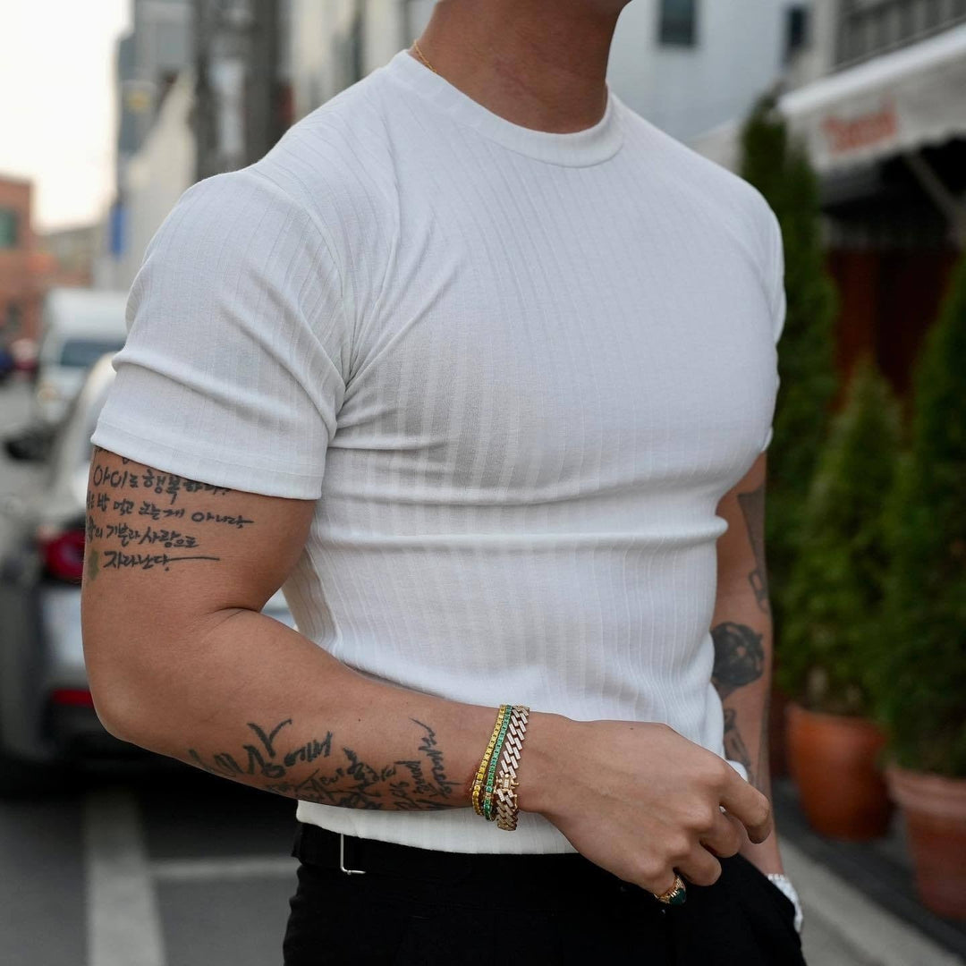 Men's slim fit ribbed performance T-shirt in white, featuring a crew neck and comfortable athletic design.