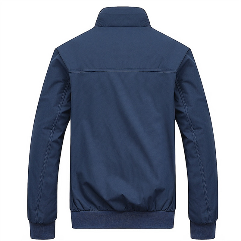 Man wearing a stylish Kensington Bomber Jacket, demonstrating its tailored fit and effortless fashion.