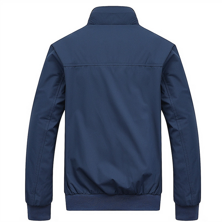 Man wearing a stylish Kensington Bomber Jacket, demonstrating its tailored fit and effortless fashion.