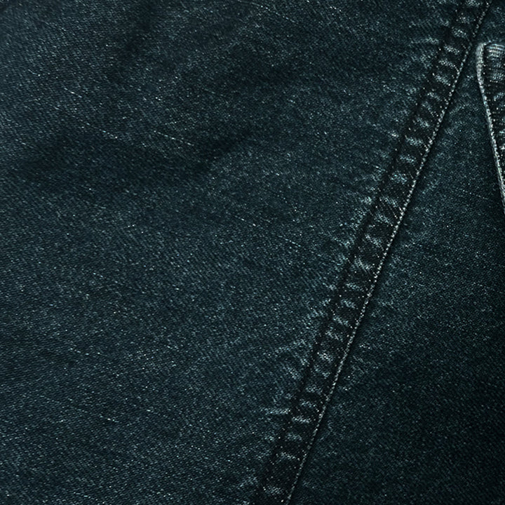 Casual men's mid-season denim jacket. Distressed blue fabric, stand collar, and vintage biker style for everyday wear.