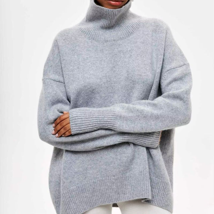 Women's comfortable oversized knit turtleneck sweater. Great for fall & winter casual wear.