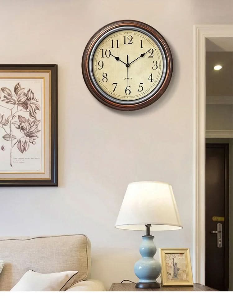 Classic style 12-inch silent wall clock with a rich brown finish. Ideal for enhancing home or office decor.