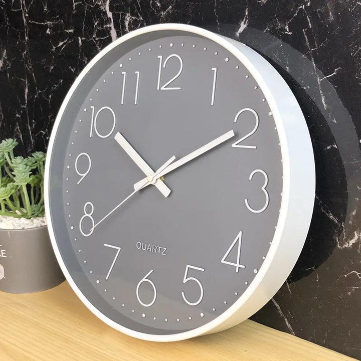 Elegant 12-inch modern quartz clock, silent and sleek for contemporary office or home.