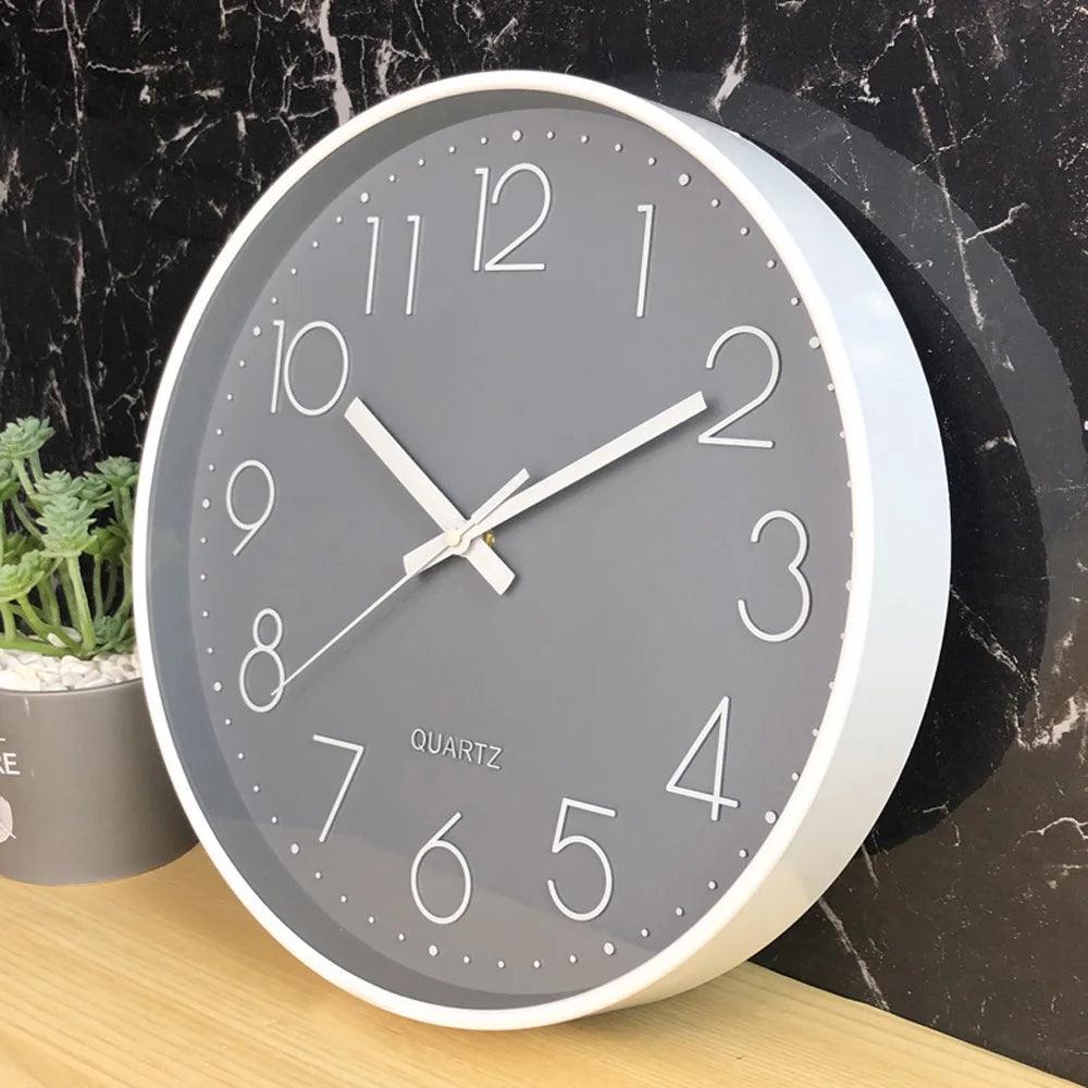 Minimalist 12-inch non-ticking wall clock, a sleek quartz timepiece for modern spaces.
