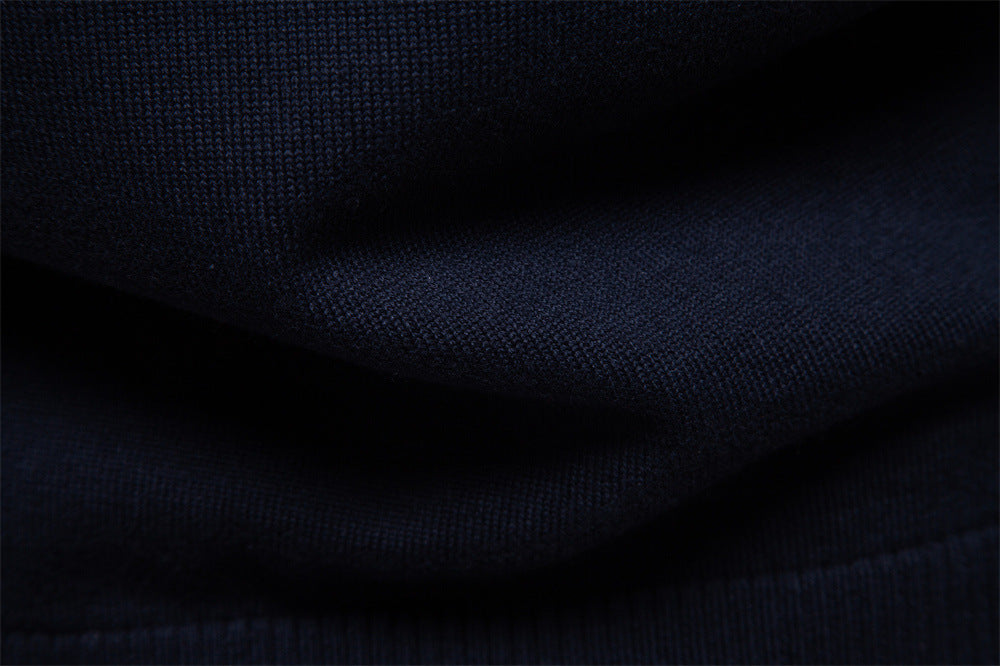 Navy blue men's half-zip knit sweater, a comfortable and versatile wardrobe staple for polished style.