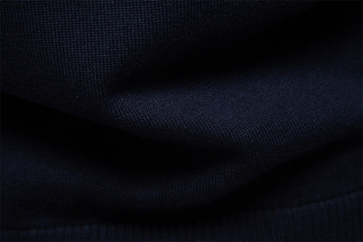 Navy blue men's half-zip knit sweater, a comfortable and versatile wardrobe staple for polished style.