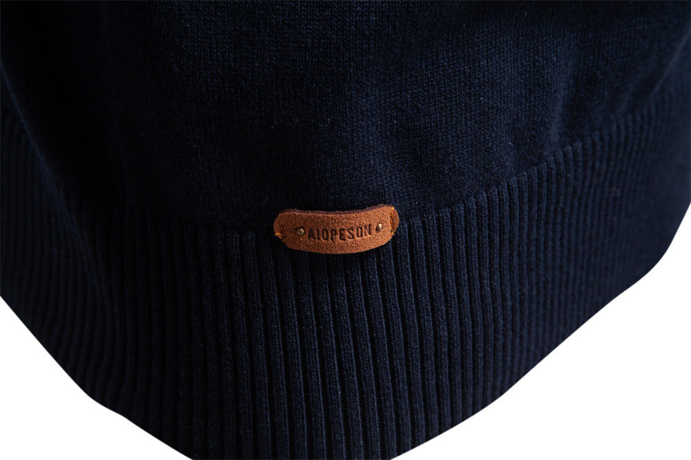 Apricot men's half-zip knit pullover, offering versatile style from casual to polished mensfashion.