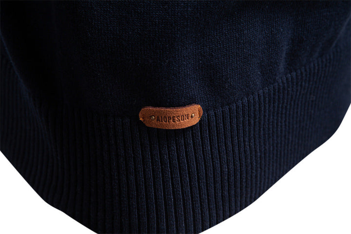 Apricot men's half-zip knit pullover, offering versatile style from casual to polished mensfashion.