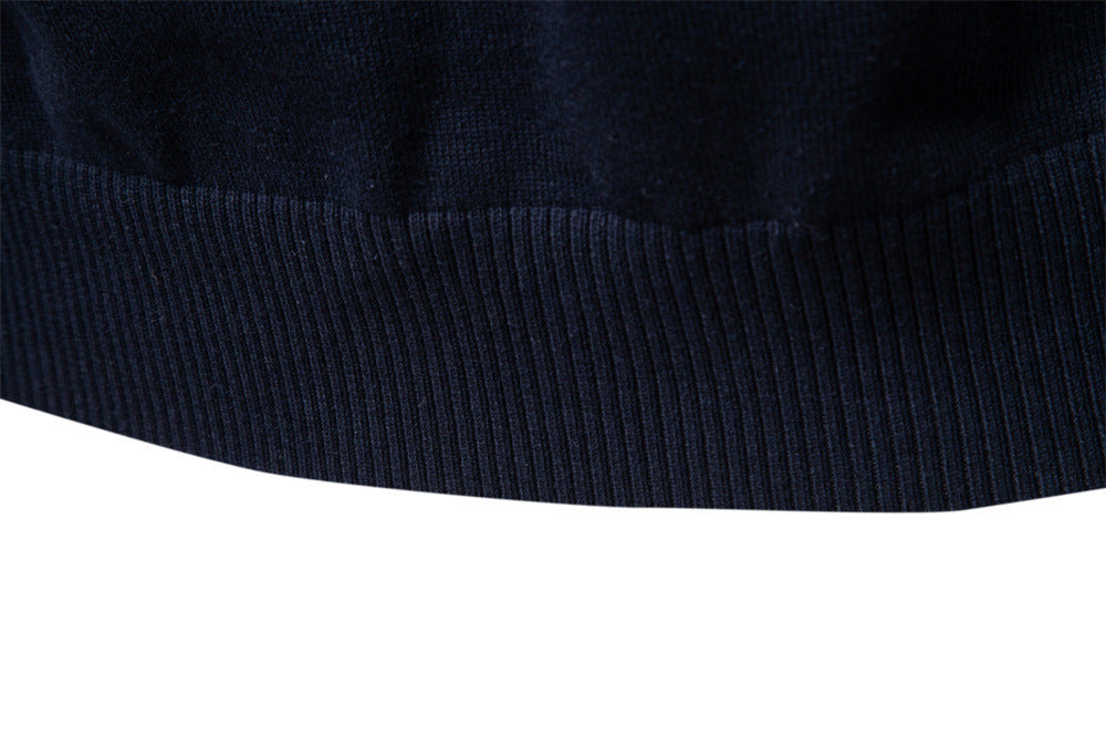 High-quality men's black half-zip knit sweater, comfortable and stylish for various occasions.