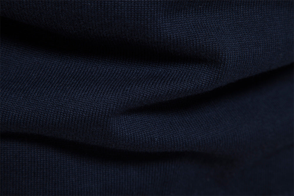 Black-blue colorblock half-zip men's pullover, modern, stylish, and perfect for layering.