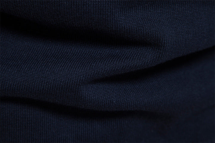 Black-blue colorblock half-zip men's pullover, modern, stylish, and perfect for layering.