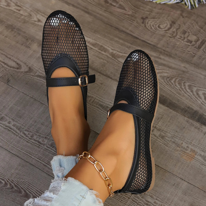 Women's comfortable mesh Mary Jane flats with buckle strap for everyday wear.