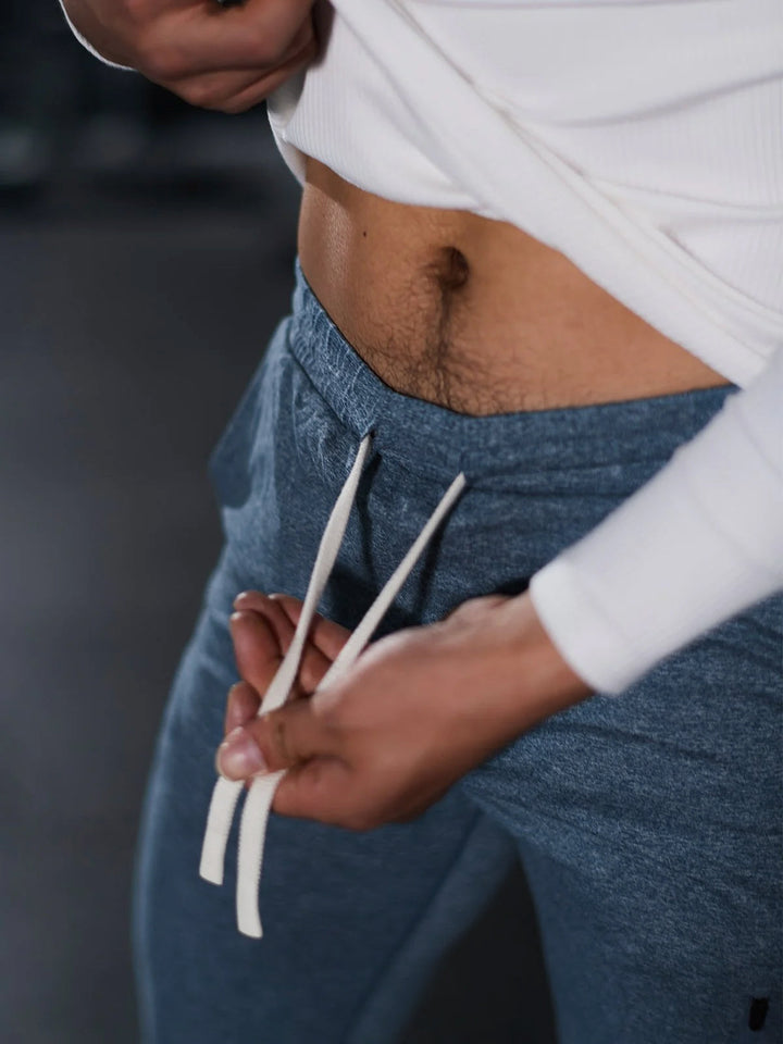 Tapered fit men's joggers; ultimate stretch pants for active lifestyles & comfort.