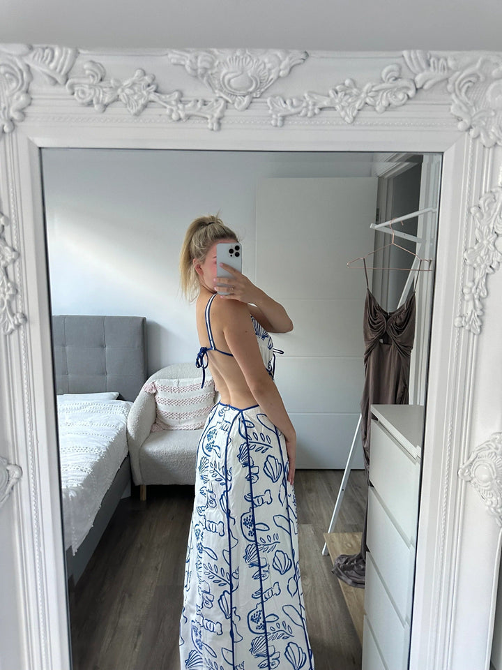 Vacation-ready women's maxi sundress, a blue flowy dress perfect for summer adventures.