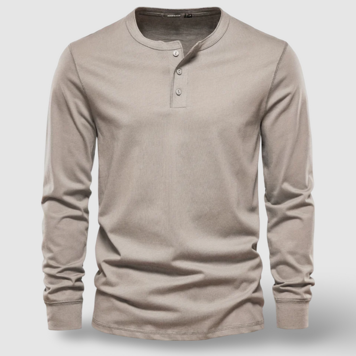 Versatile men's solid long sleeve henley shirt with button collar, perfect for casual wear.