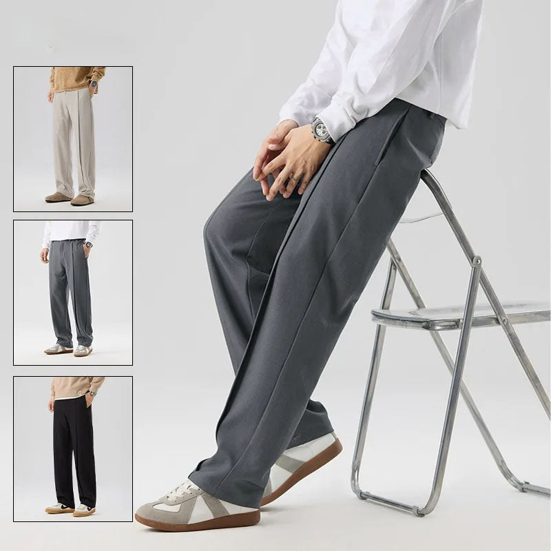 Men's refined black pleated drape trousers, ideal for comfortable and versatile daily wear.