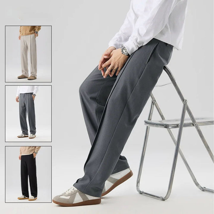 Men's refined black pleated drape trousers, ideal for comfortable and versatile daily wear.