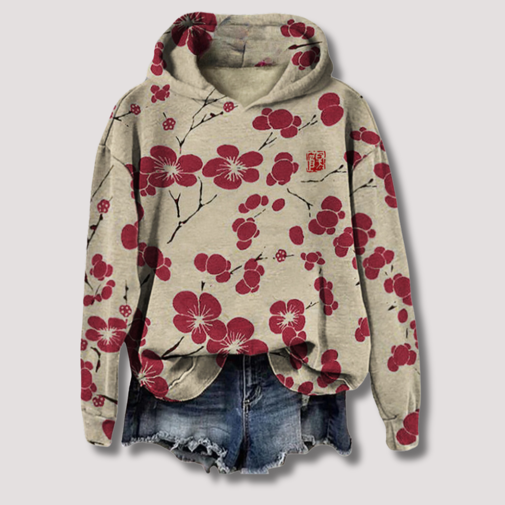Casual women's long-sleeve floral print hooded sweater. Stylish and comfortable layering piece for spring and summer fashion.