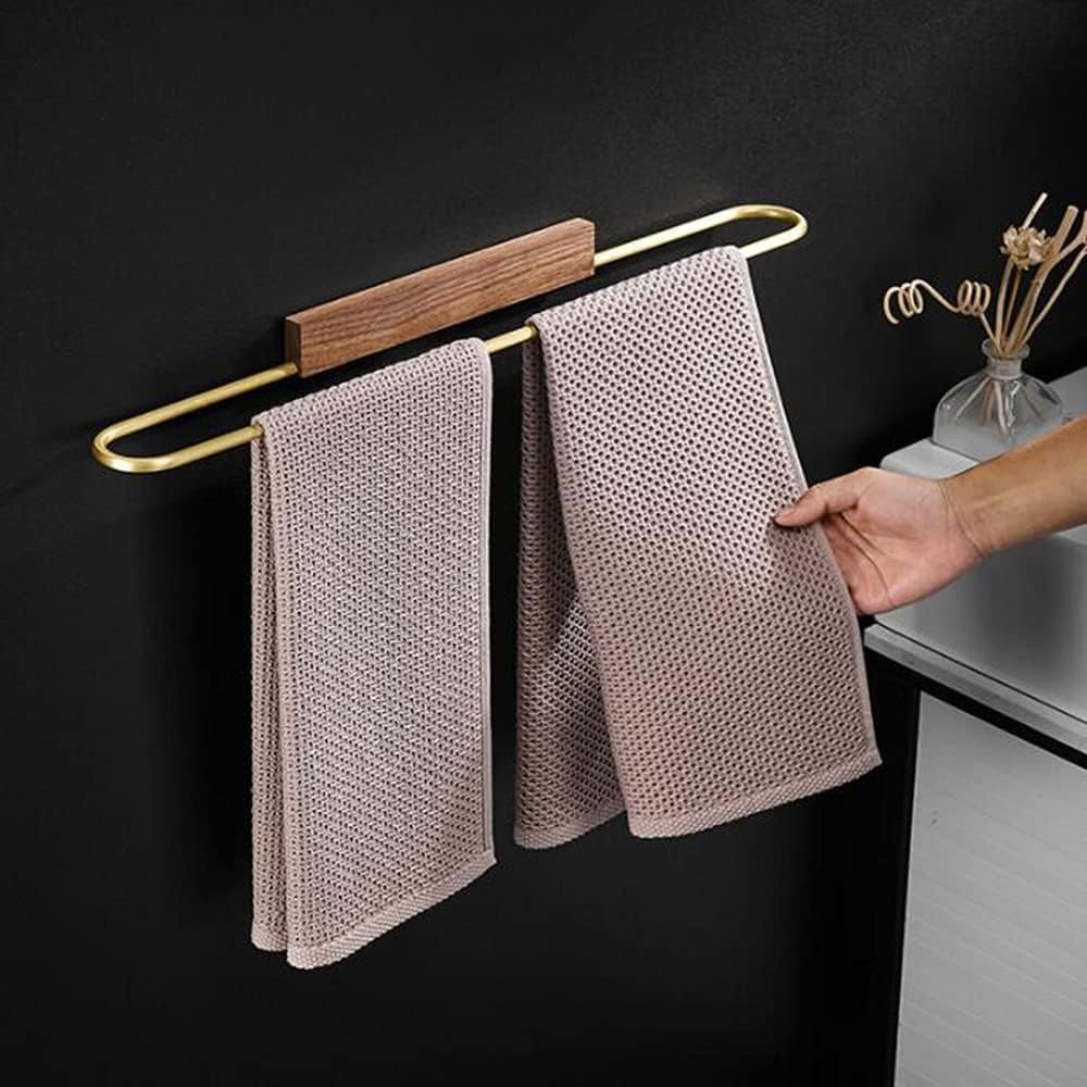 Elegant Hearthside walnut towel bar with brass details. Wall-mounted wood accent for modern bathroom organization.