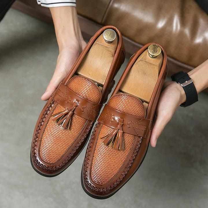 Modern classic men's woven tassel loafers. Perfect blend of formal sophistication and casual comfort in a slip-on design.