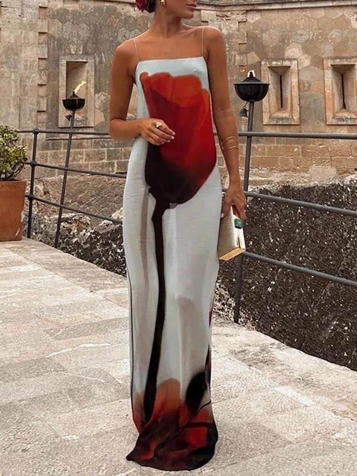 Women's flowy blue abstract print maxi sundress. Comfortable, elegant sleeveless summer dress for beach or vacation.
