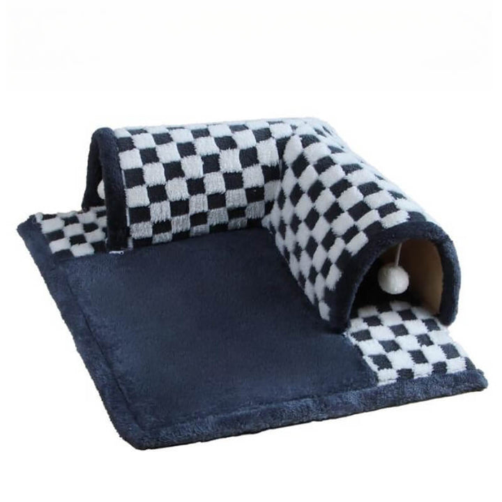 Happy cat exploring the integrated play tunnel of the plaid pet bed, a fun cat accessory