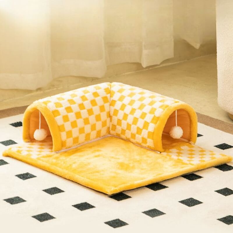 Compact and cozy cat bed that transforms into a play tunnel, ideal for small spaces