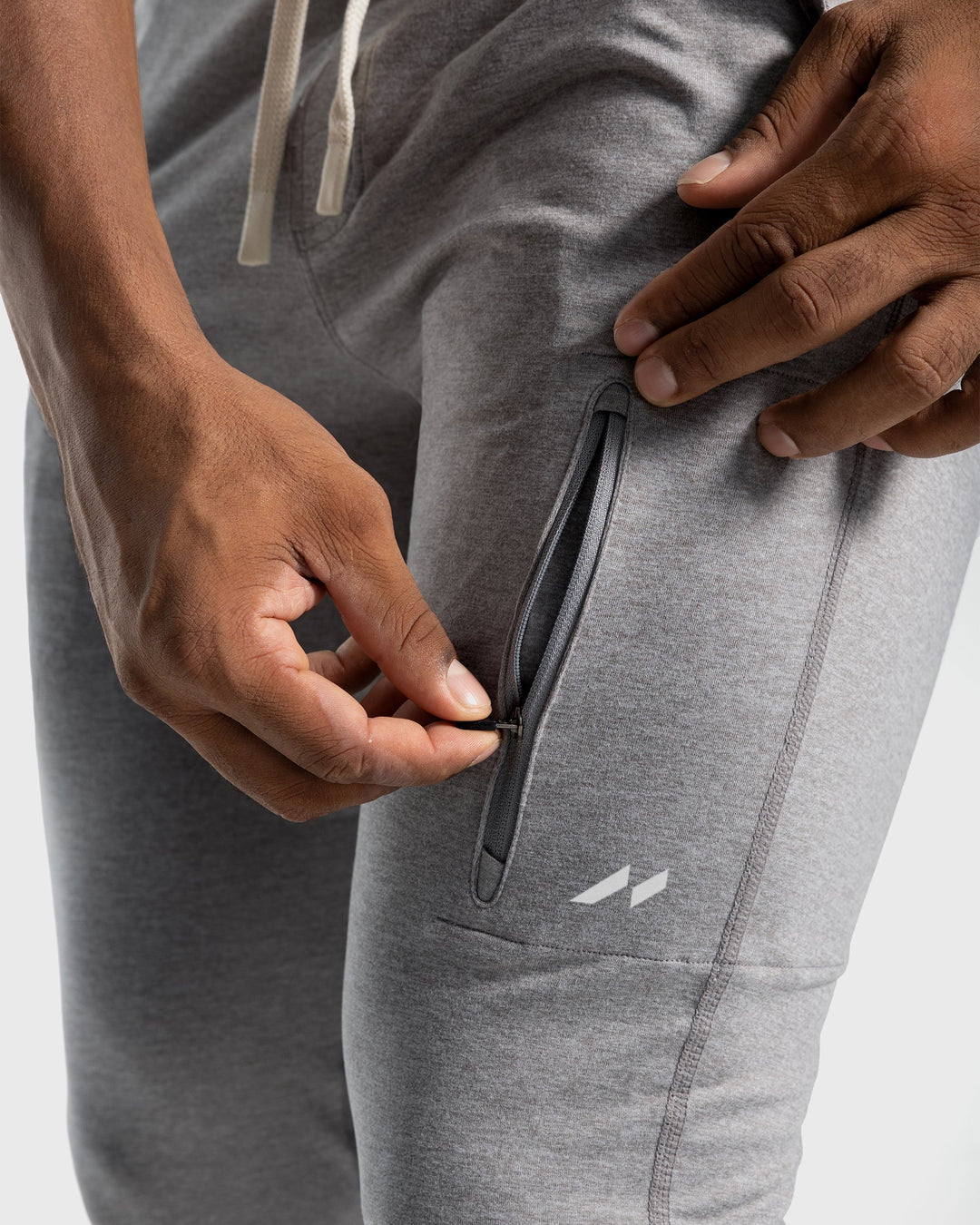 High-performance men's stretch joggers; tapered fit activewear for comfort & movement.