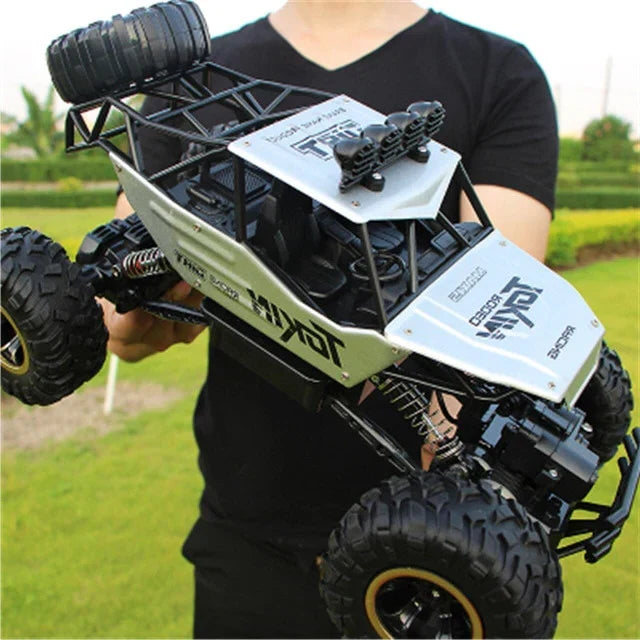 Powerful 4WD RC monster truck for kids. Remote control, all-terrain off-road racing toy for adventurous outdoor play.
