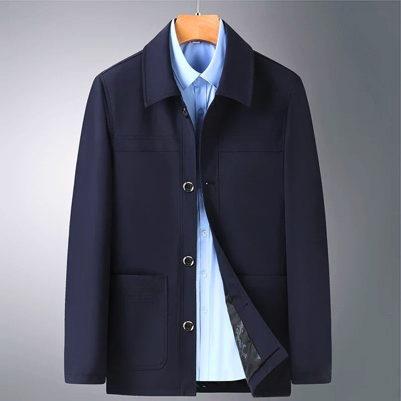 Stylish men's Arlan Ridge versatile jacket in navy blue. Durable all-season outerwear for business casual fashion.