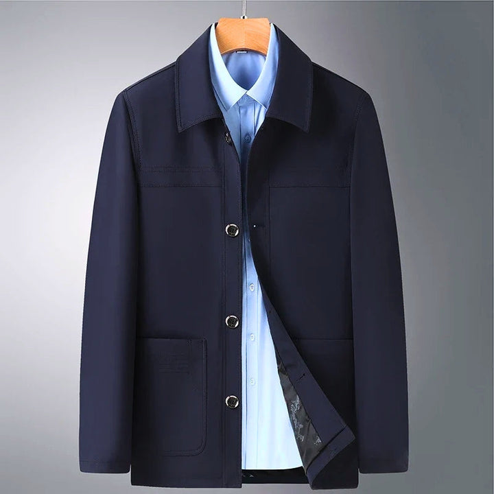 Stylish men's Arlan Ridge versatile jacket in navy blue. Durable all-season outerwear for business casual fashion.