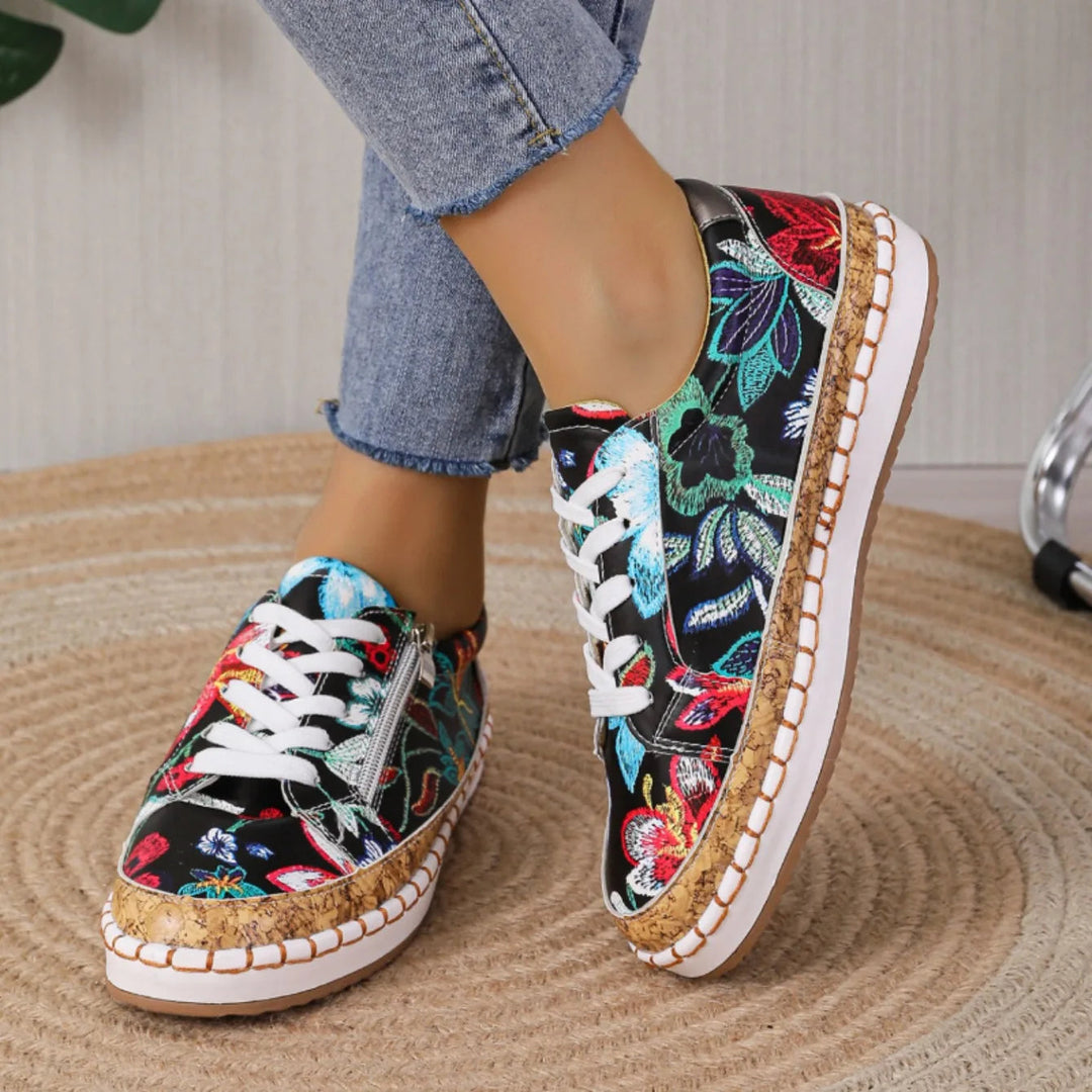 Close-up of black floral lace-up women's flats, showcasing the elegant design for casual wear.