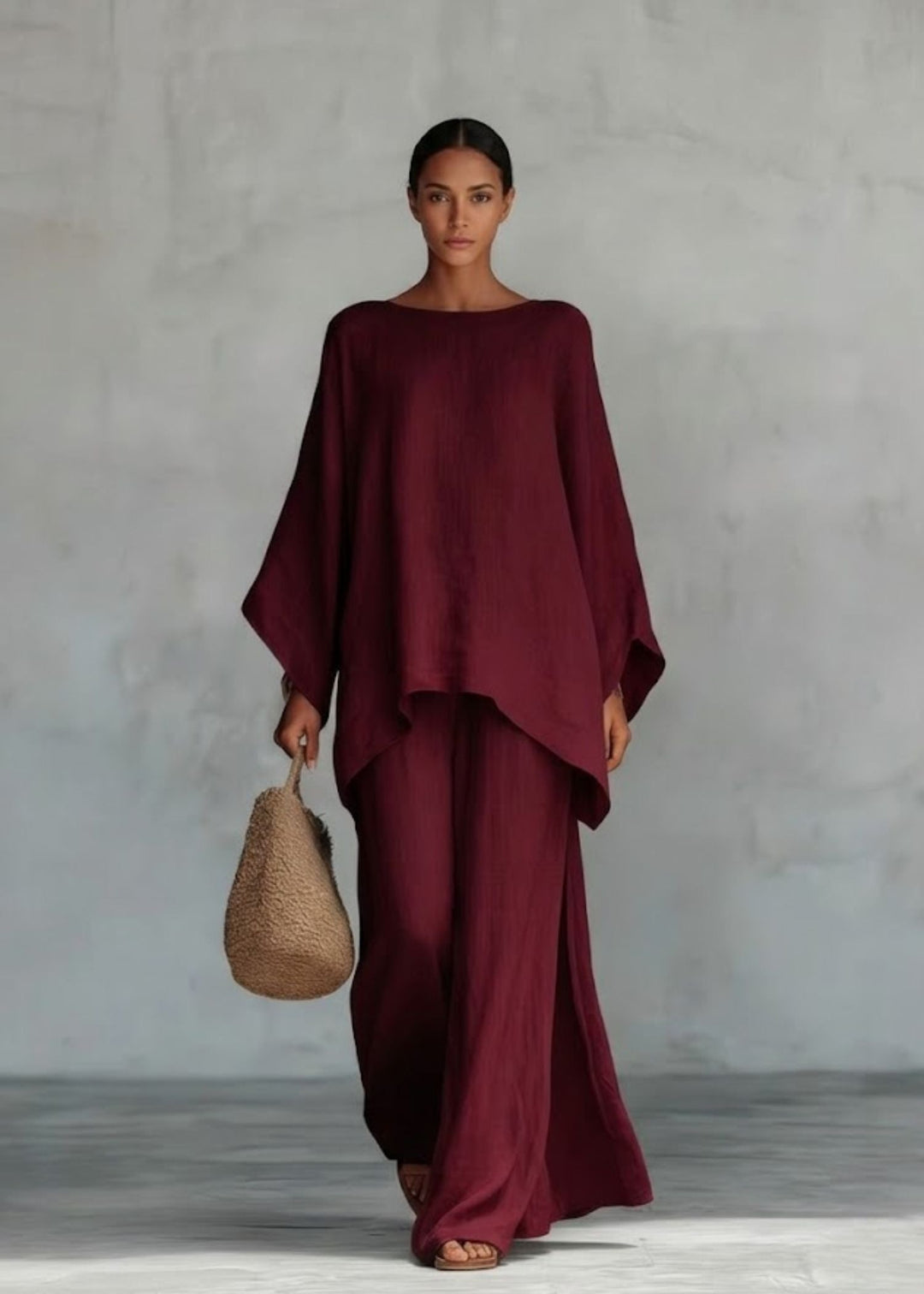 Elegant women's two-piece set: a stylish cape top & wide leg pants, ideal for summer parties or vacation.