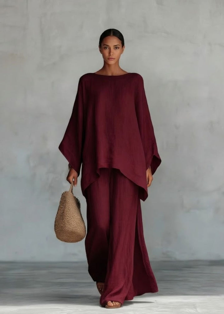 Elegant women's two-piece set: a stylish cape top & wide leg pants, ideal for summer parties or vacation.