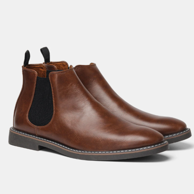 Durable men's black leather Chelsea boots, slip-on comfort for all-day wear & sophisticated style.