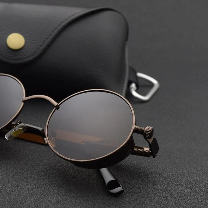 Unisex round shades with a lightweight aluminum alloy frame. Classic design with essential UV protection eyewear.