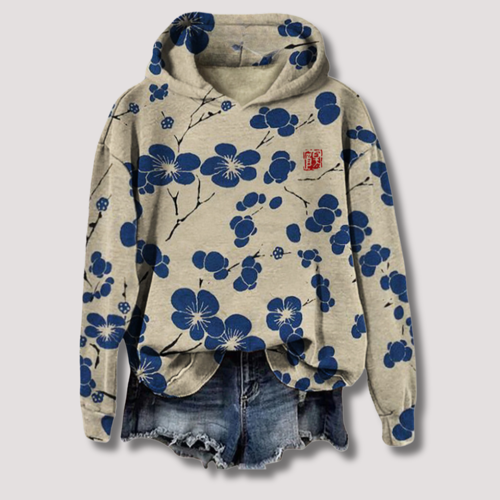 Lightweight women's floral print hooded sweater for ultimate summer comfort. Relaxed fit, trendy spring & summer top.
