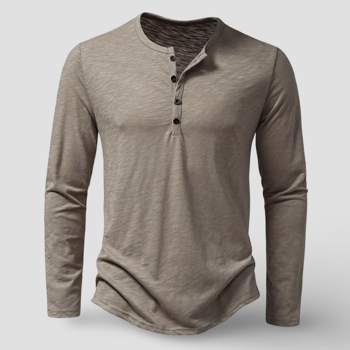 Stylish men's long sleeve henley top with a versatile button placket, ideal for casual and classic menswear.