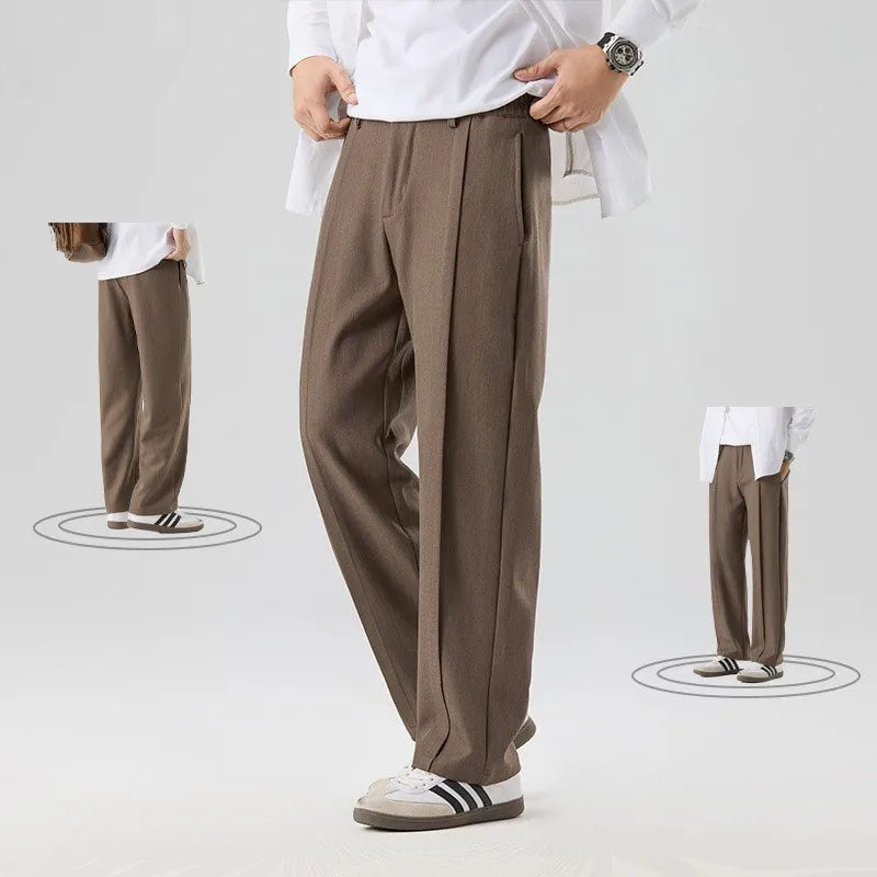 Brown men's pleated drape trousers featuring a relaxed fit & elegant pleats for comfort.