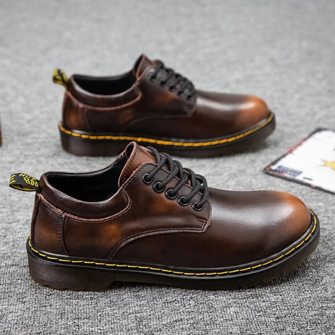Stylish men's genuine leather low-cut shoes, perfect for casual everyday comfort.