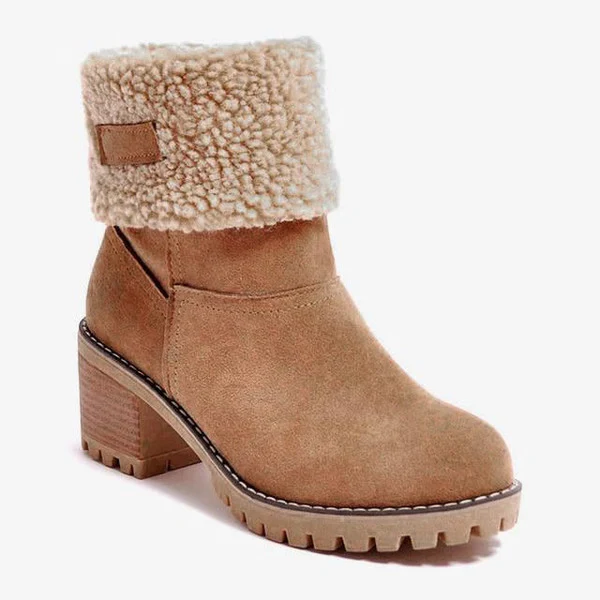 Warm women's ankle snow boots with a block heel. Stylish, waterproof winter footwear for comfort in cold weather.