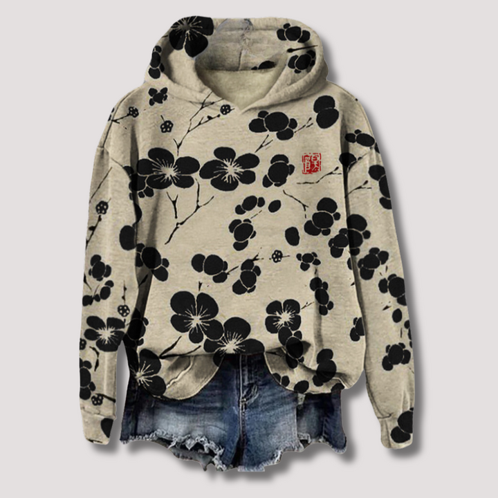 Women's stylish floral print hooded sweater, perfect lightweight long-sleeve top for summer casual wear.