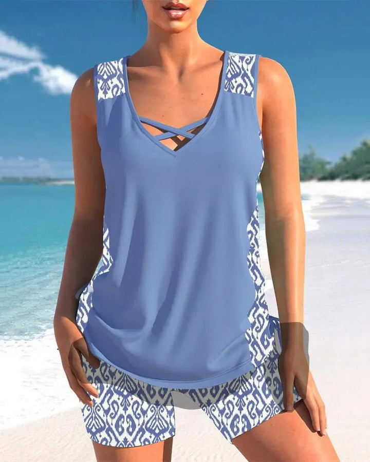 Gray women's stylish tankini set, comfortable beachwear with adjustable straps for confident summer swim.