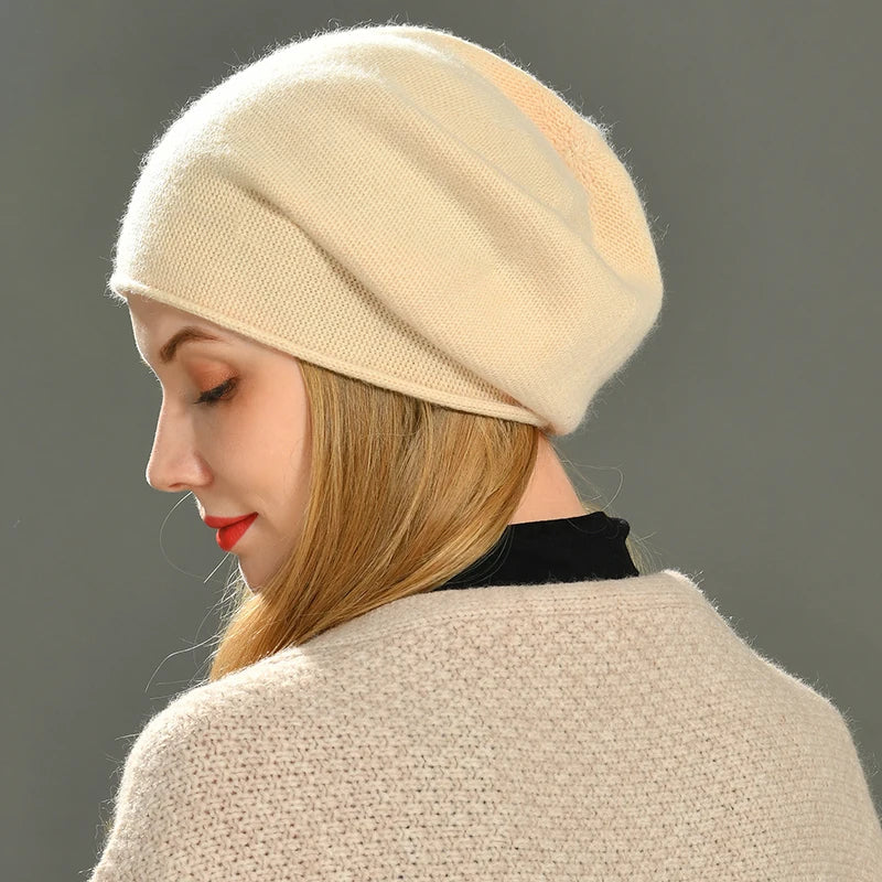 Warm knit women's slouch beanie. Comfortable & stylish accessory, ideal for everyday fall/winter wear.