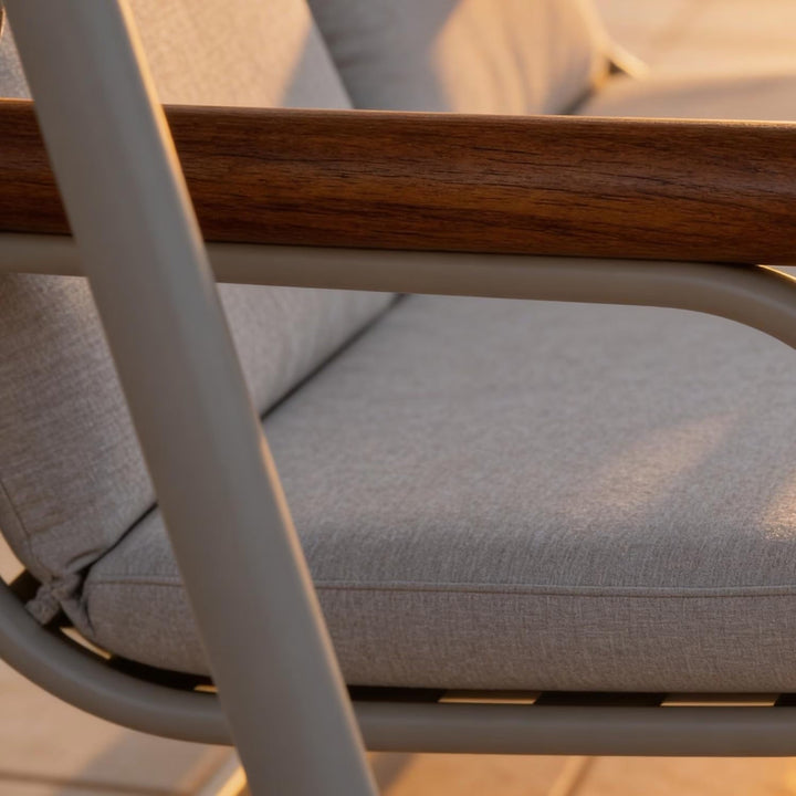 Elegant cream 2-seater outdoor swing chair with a weather-resistant aluminum frame, ideal for balcony or patio seating.