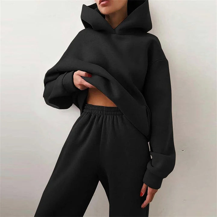 Versatile women's Serenity athleisure set, includes a relaxed hoodie & joggers for activewear or casual comfort.