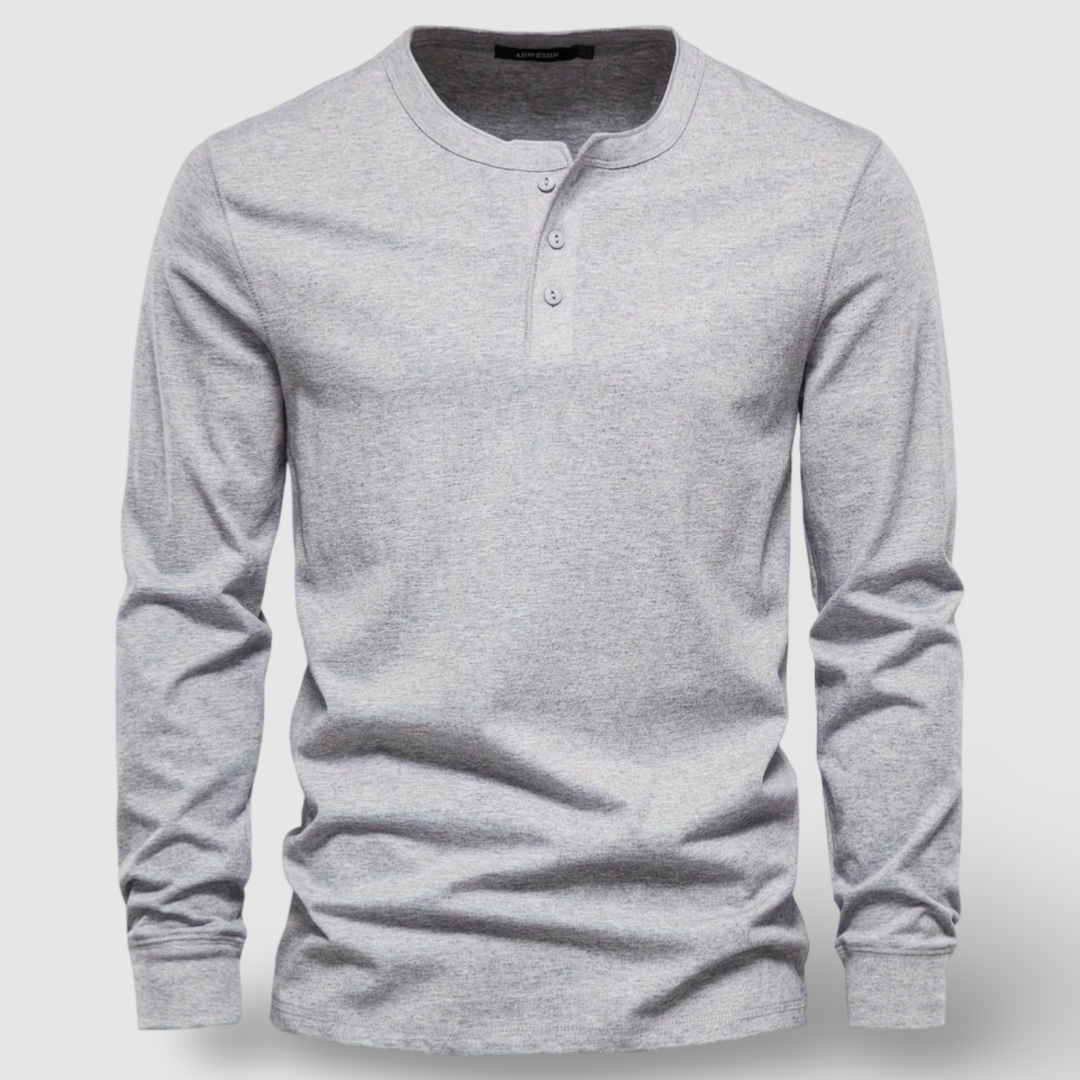 Comfortable men's long sleeve henley shirt with button placket, ideal for everyday outfits.